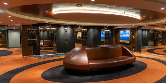 Elevator lobbies aboard MSC Meraviglia feature attractive seating (Photo: Aaron Saunders)