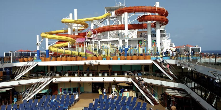 Carnival Vista waterslides and rows of sun loungers on the Lido Deck