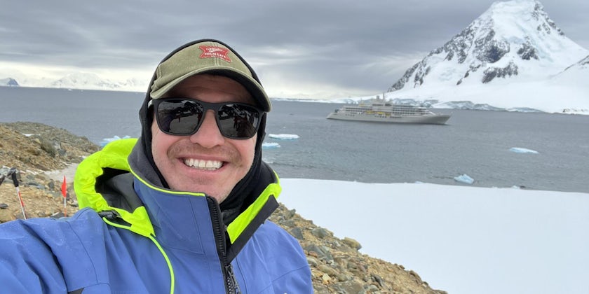 Conrad Combrink SVP Expeditions, Silversea in Antarctica with Silver Endeavour in the background (Photo: Conrad Combrink)