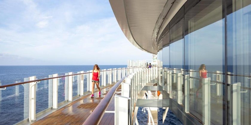 Jo Kessel walks on the promenade deck of P&O Cruises Arvia