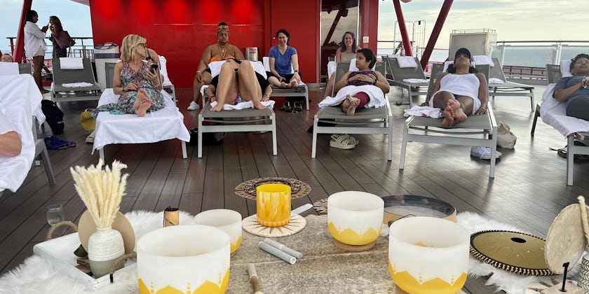 Limitless Voyage guests prepare to undergo a healing sound bath session at The Perch, located on Deck 17 of Virgin Voyages’ Scarlet Lady (Photo/Nicole Edenedo)
