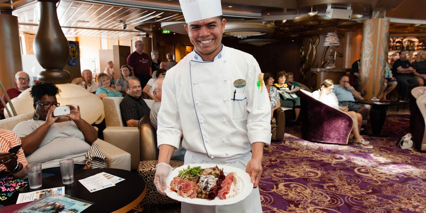Chef giving a cooking demo on Grandeur of the Seas