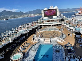 Royal Princess topmost deck with pool, movie watching and Sanctuary.