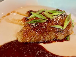 Crispy roasted Peking duck
pak choi and plum hoisin sauce in East to West.