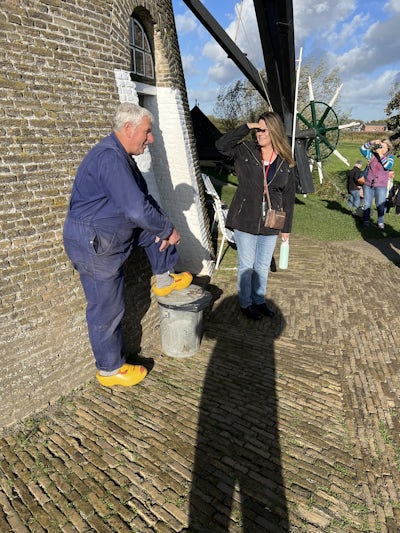 Wife talking to a Netherlands citizen who has lived in a windmill with his wife for 40 years. Every person we met in Europe was friendly and genuine.