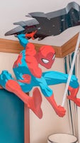 A nice touch you can add to surprise children is having some super heroes hanging from the ceiling when you enter your stateroom! 