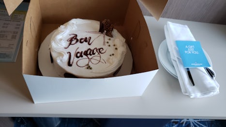 My Bon Voyage cake. It was vanilla and strawberry, but I couldn't eat it all, as it was too big. I threw the rest out at the end of the cruise. :(