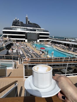 Enjoying a coffee at the main pool