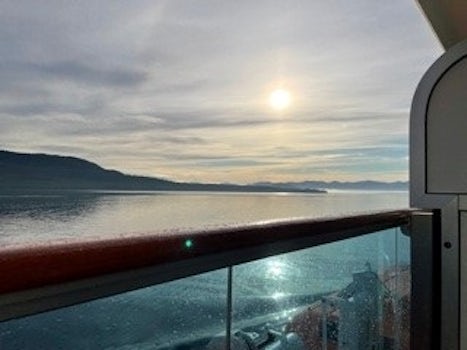 View form cabin balcony sunrise approaching Ketchikan , AK Port 