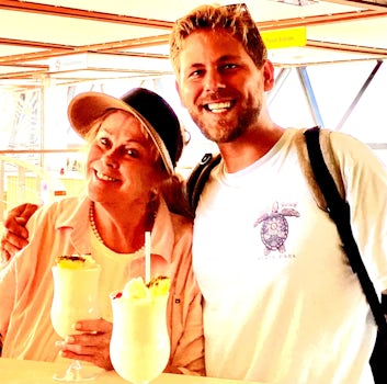 Me & my son w our very first Piña Colada’s…heading to the pool!
