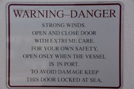 Warning on bulkhead door to our balcon.
