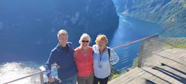 This is Geiranger Norway and my husband, myself and My Mom. 
If you can ever get to the Fjords in Norway please do. You won't regret it. 

Norway is the cleanest place I have ever been. Pristine!  It is also the most gorgeous. The fjords are so amazing and the colour is so brilliant. Flam and Olden along with Geiranger were the top three stops.  