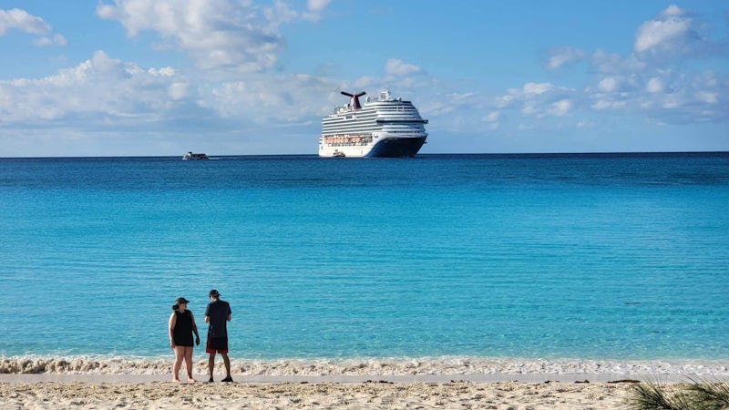 A photo of the ship off of the beach at Half Moon Cay