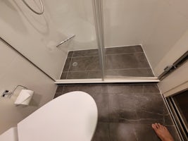 Poor engineering, could not sit as knees would hit the shower glass.