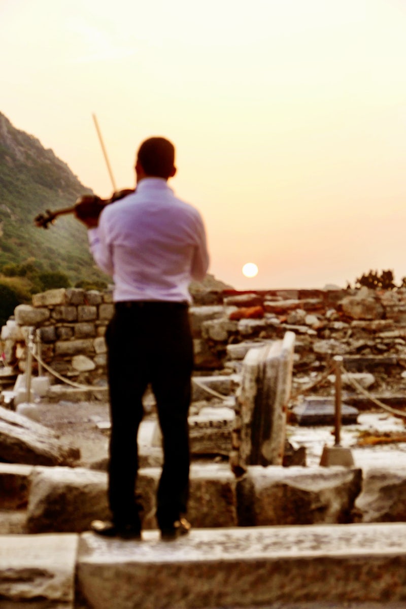 Azamara ~ Evening Ephesus...  A musician practicing before the concert.