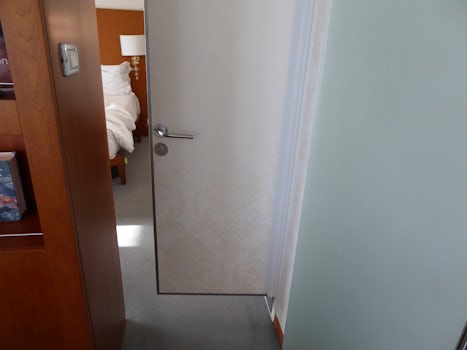 Bathroom door opens to passageway from LR to BR--terrible design.