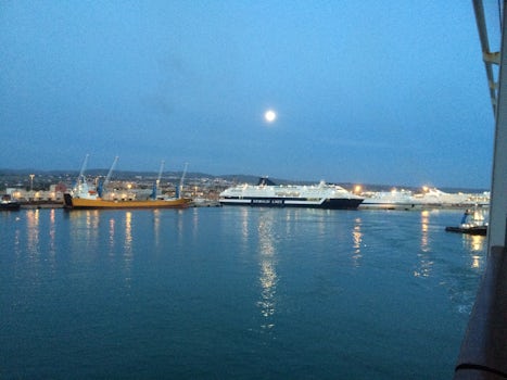 The moon rising over Civitavecchia after a hectic day