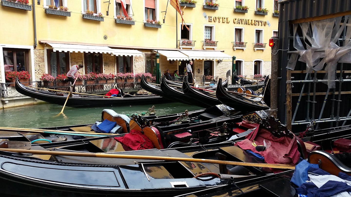 Venice hailing gondola NW of St Marks sq