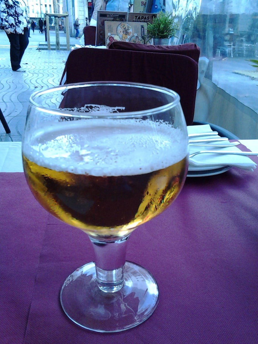 Stopped for a beer at Top Tapas, one of many cafes on La Ramblas.  The "pricey" beer was good but what does one expect on La Ramblas, Barcelona's touristy main avenue.