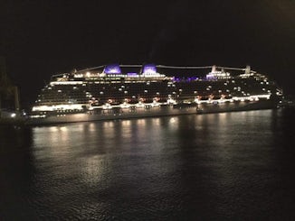 Night shot if Britannia at berth in Barbados, taken from Ventura
