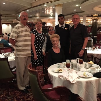 Us with our dining room staff and our cruising companions.