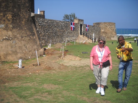 Local man pursing wife with necklace for sale at Fort San Felipe.