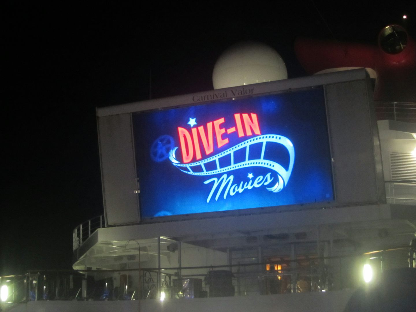 Dive-in Movies on the pool deck at night