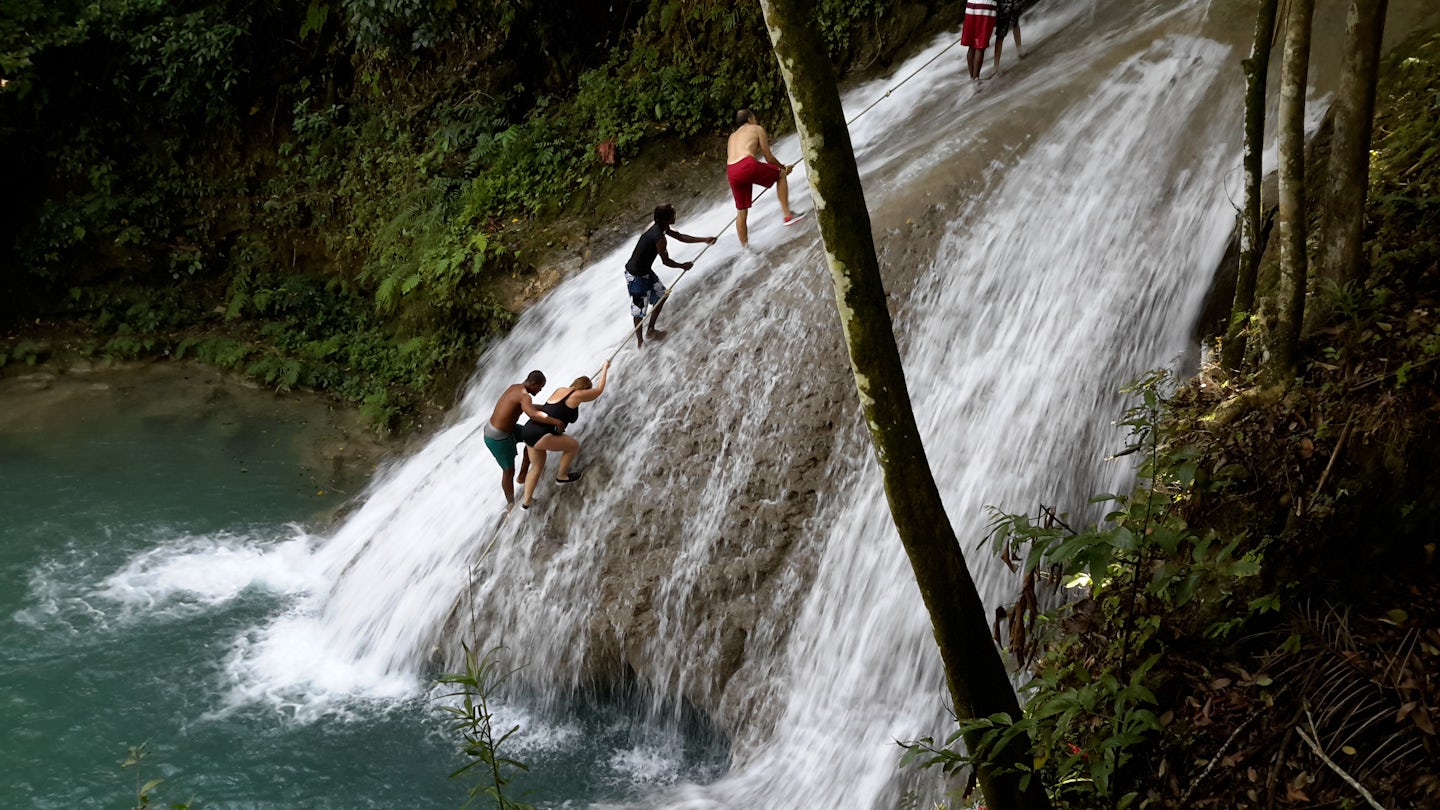 This is at the "Blue Hole" a less crowded place than Dunn's River Falls. We just got our own tour after arrival at Ocho Rios & this was part of it. We spent a couple of hours there. Extra cost to participate in the falls walk, rope swing, etc.