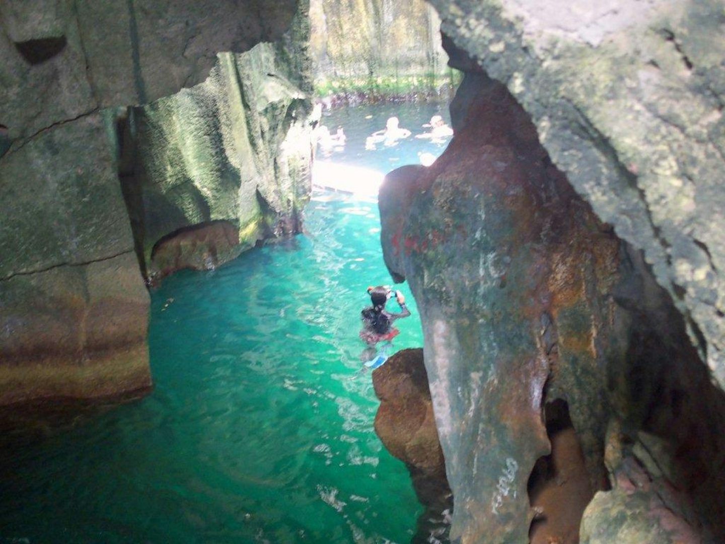 Swimming in the pool in the cave on Sawa-i-lau Island after going ashore form the Fiji Princess