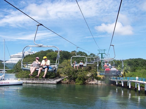 On the ski lift chairs to the Carnival beach at Roatan