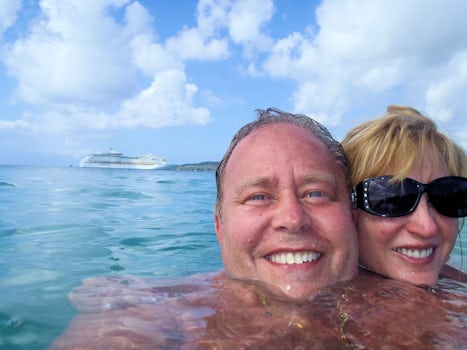 A ocean swimming selfie with our ship in the background.