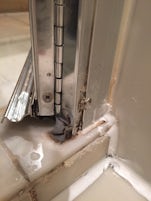 Grime in shower after cleaning
