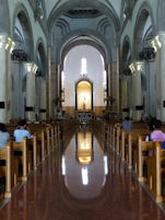 Reflection in the highly polished central aisle of Manila Cathedral.