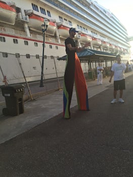 Cruise Director Silas on stilts greeting us back to the Ship! Always fun ne