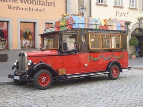 Vehicle in front of Christmas shop in Rothenburg.
