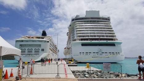 Norwegian Escape (right) in port in Tortola next to Norwegian Spirit.