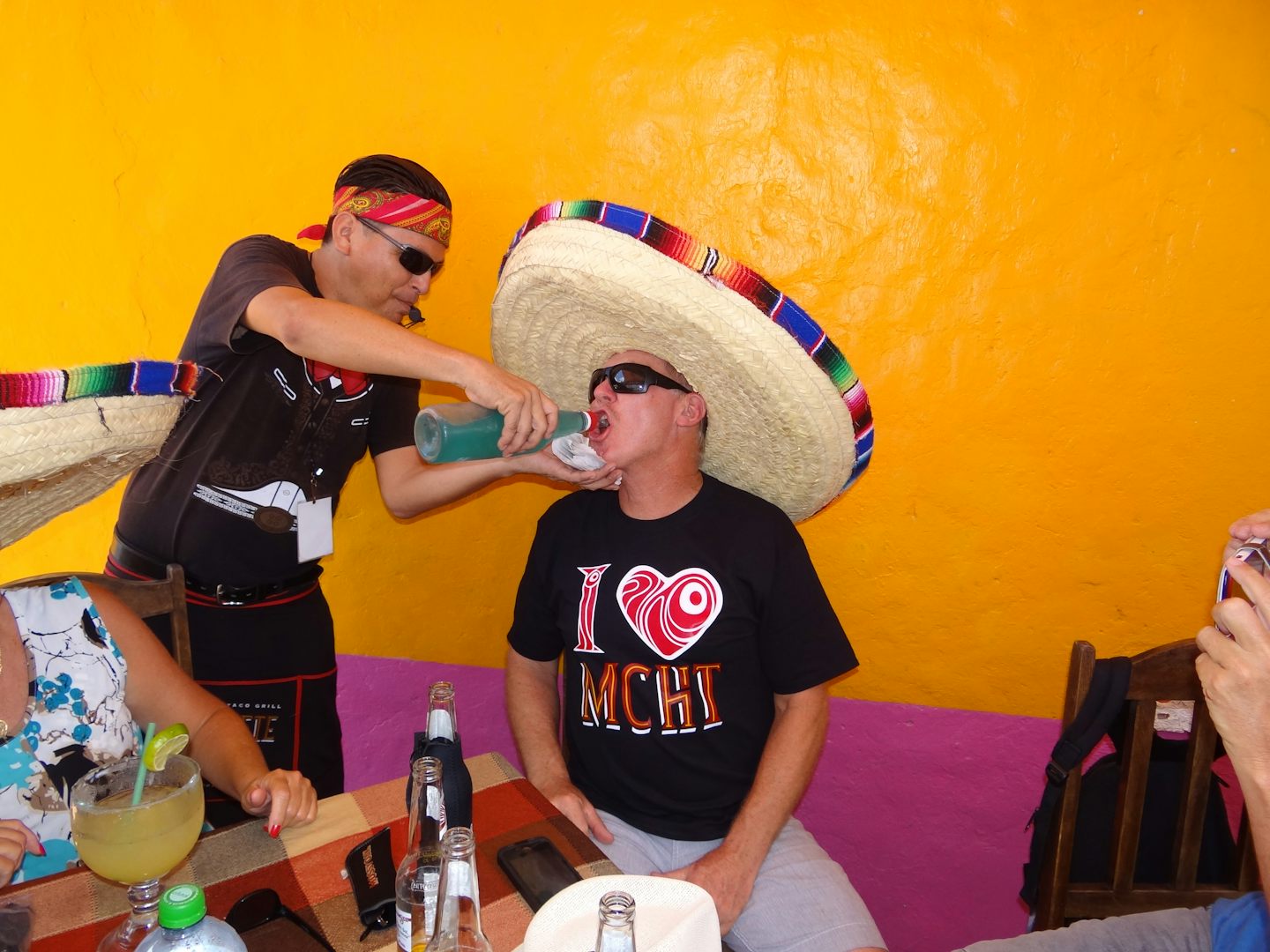 Patch getting a tequila shot in Mexico