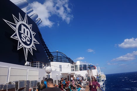 Enjoying a Pina Colada on MSC Cruise deck, sailing towards Santorini, Greec