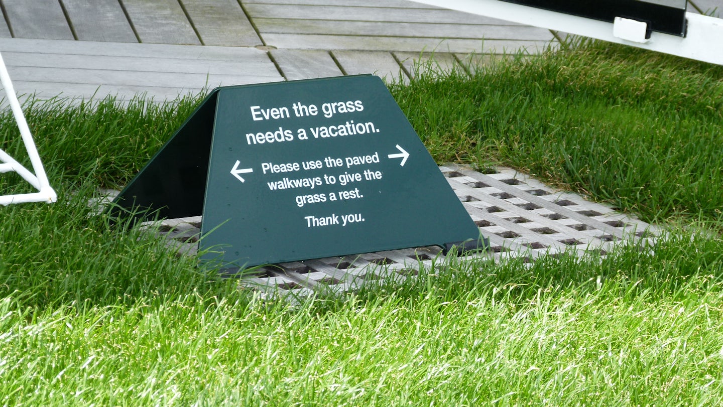 "Even the grass needs a vacation" keep off. More un-usable deck are