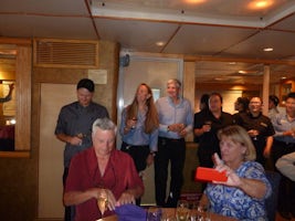 Chef Mark, Pam, other crew members joining in for final dinner's toast. They had juice, we had Champagne