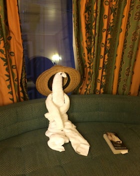 Another towel animal lounging on the window seat in our Interior Promenade