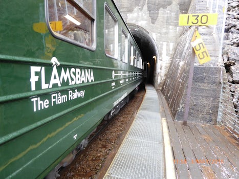 Flamsbana, the Flam railway - twists and turns 21 tunnels, waterfalls everywhere. Easy to arrange your own tickets on-line.