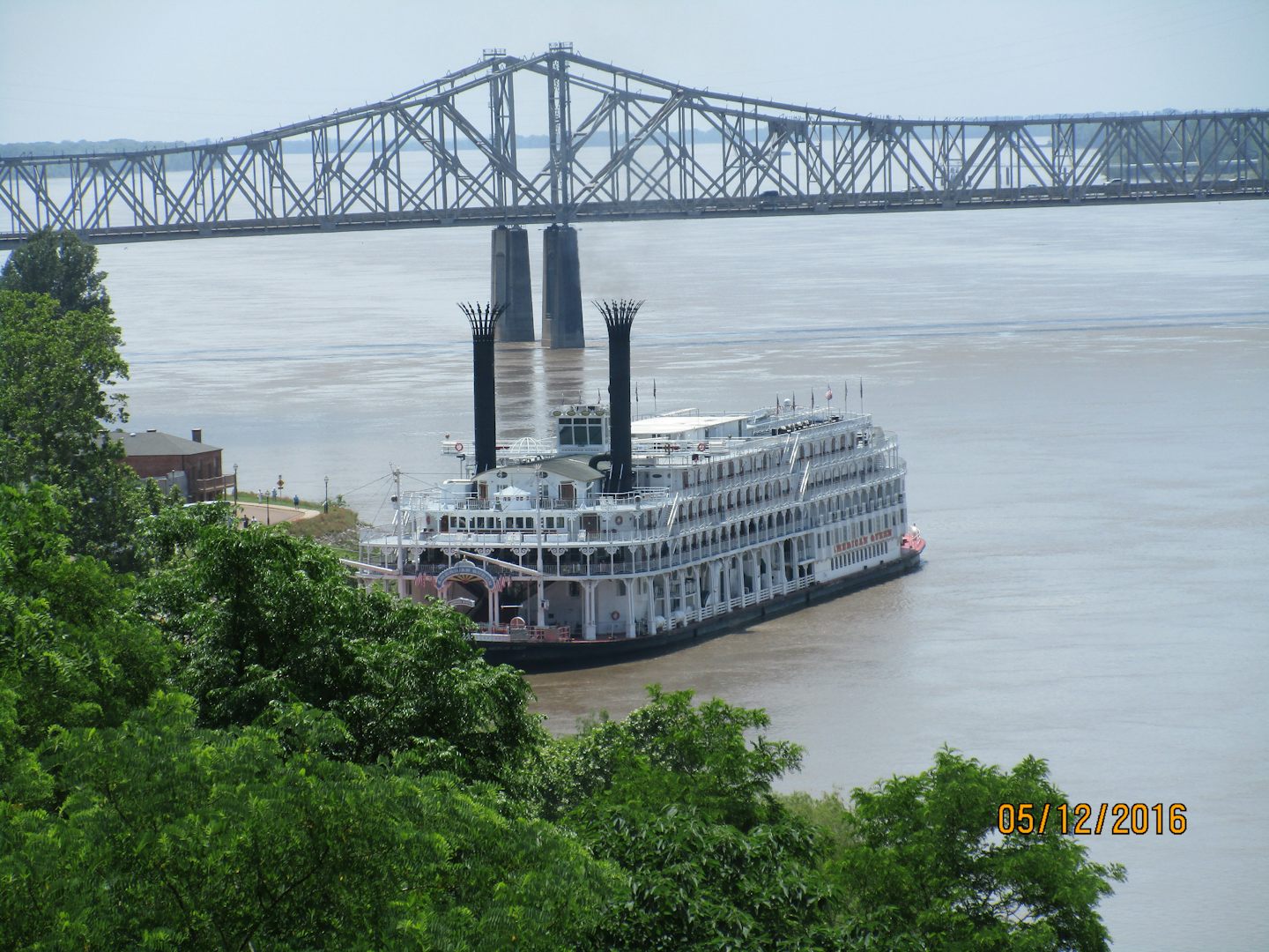 Beautiful American Queen docked at a port of calLevee at Natchez, MS.l.