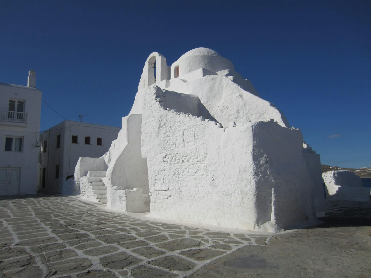 Tiny White Church in Mykonos Old town.