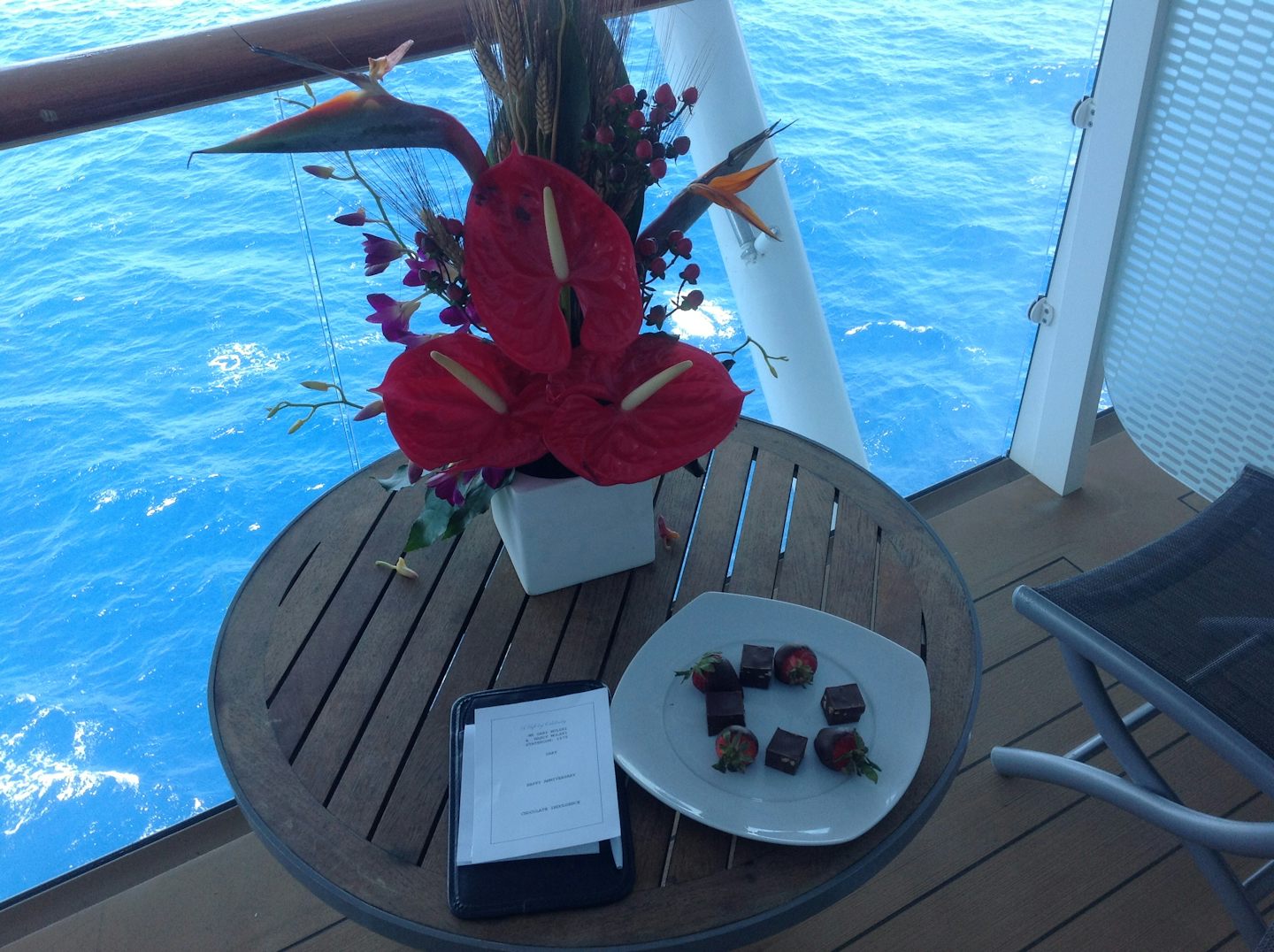 Anniversary flower arrangement arrived at room day of sailing with truffles