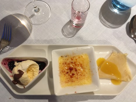 And last, but not least, the Trio Dessert to end our cruise.  Blue berries ice-cream, creme brulee and crepe suzette!!
Again, thanks to Exec Chef Dimitri and staff.  Enjoyed the food!!