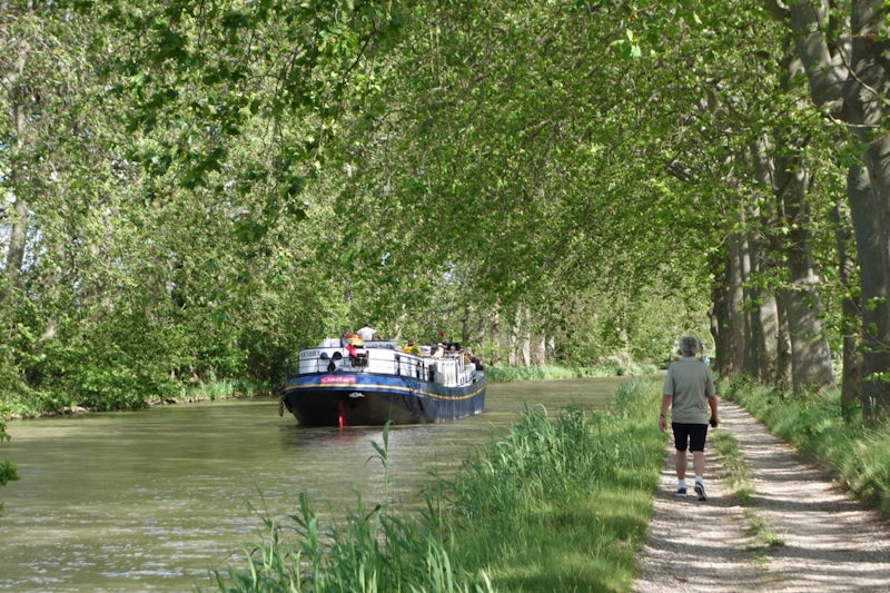 you can walk faster than the barge is travelling; biking along canal towpath is another option