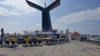 The back deck of the ship with the small pool on the first day