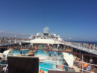 upper deck lounge for aurea guests with separate sun beds