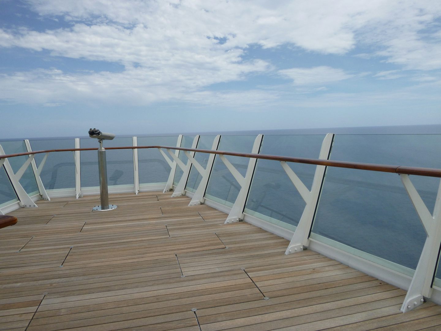 The sundeck, which you can access from port side, floor 14. It is a large and quiet spot with excellent views. This is just one of the viewing areas on the deck.